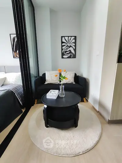 Stylish small living room with modern decor and cozy seating area