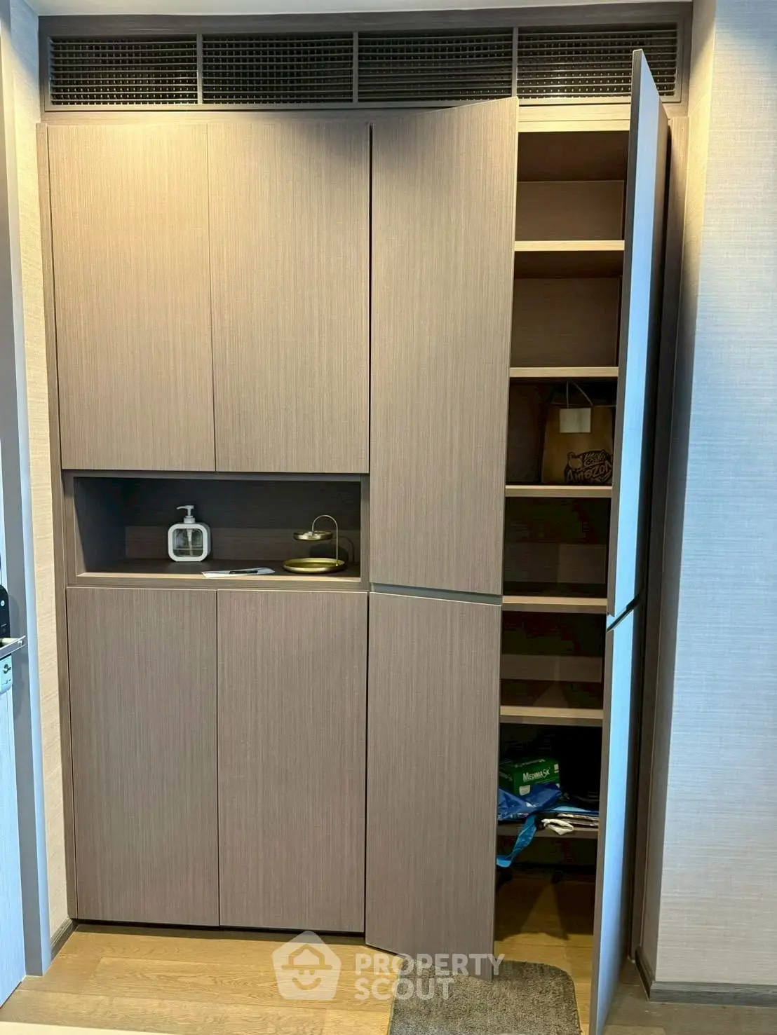 Modern storage cabinet with open shelving and sleek design