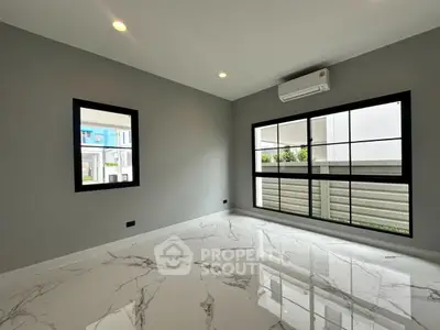 Modern empty room with marble floor and large windows in a new home