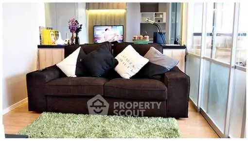 Cozy living room with plush sofa and modern decor