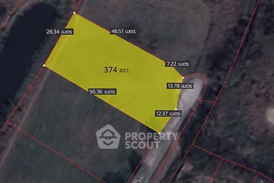Aerial view of a 374 square wah land plot with boundary lines and measurements.