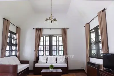 Charming living room with elegant decor and natural light