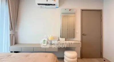 Modern bedroom with stylish vanity and air conditioning unit