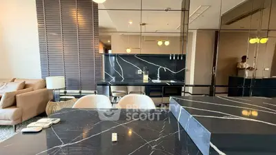 Luxurious modern living room with elegant marble accents and stylish furnishings