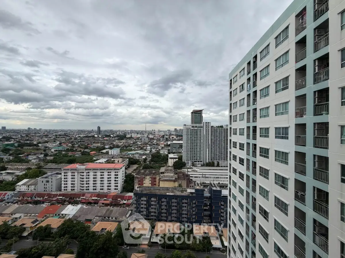 Stunning cityscape view from high-rise building with expansive skyline and urban landscape.