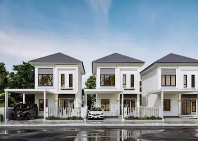 Modern duplex homes with sleek design and carports in a serene neighborhood.