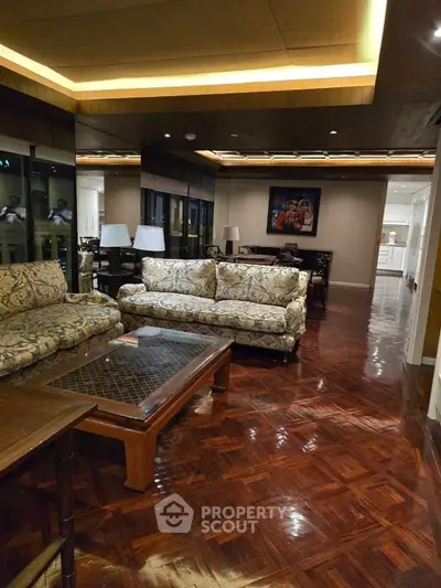 Luxurious living room with elegant furniture and polished wooden flooring