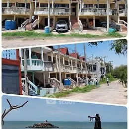 Charming multi-unit residential building with parking, near scenic waterfront view.