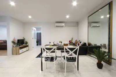 Spacious modern living room with dining area and stylish decor