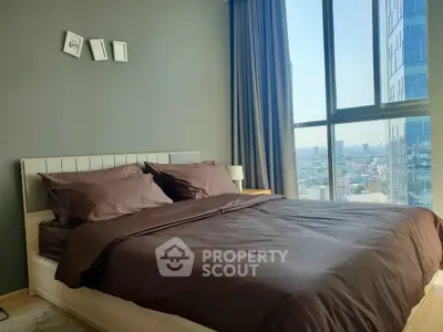 Luxurious bedroom with stunning city view and modern decor