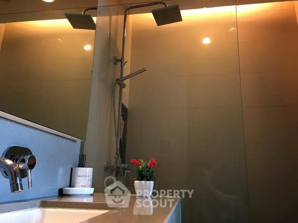 Modern bathroom with sleek fixtures and ambient lighting