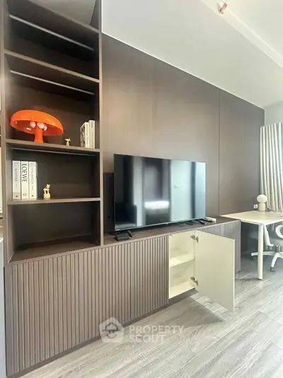 Modern living room with sleek TV unit and stylish decor