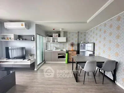 Modern open-plan living room with stylish decor and dining area