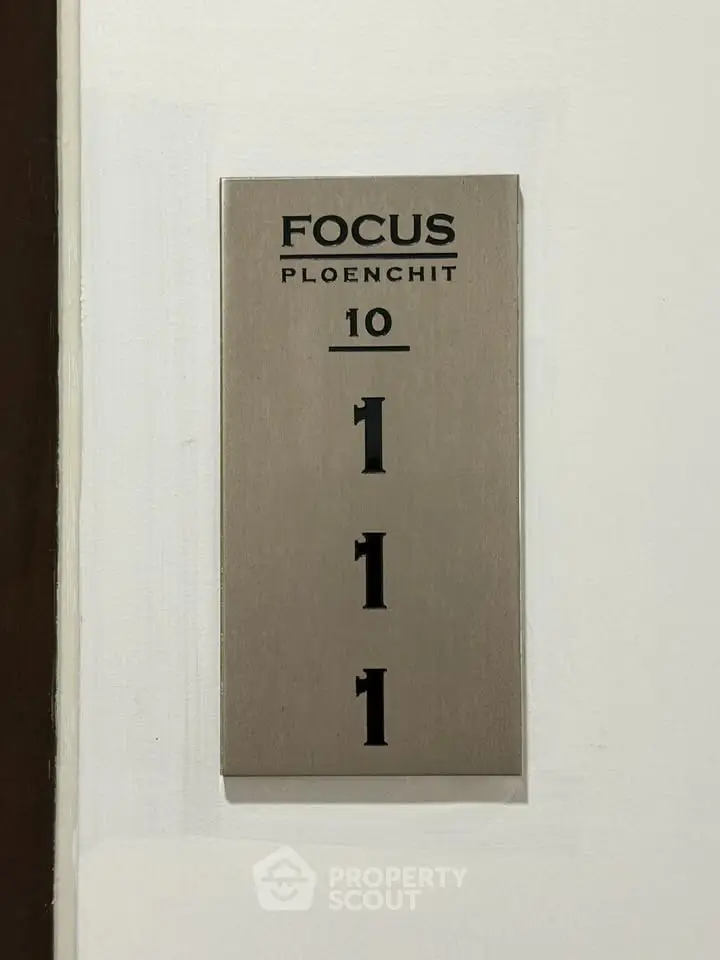 Focus Ploenchit building floor number sign with modern design
