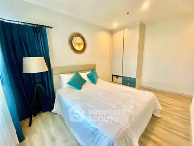 Bright and modern bedroom with stylish decor and ample natural light
