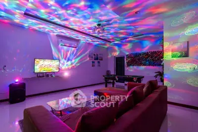 Vibrant living room with colorful lighting and modern decor