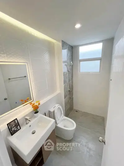 Modern bathroom with sleek fixtures and natural light