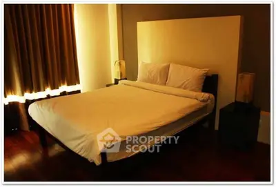 Cozy bedroom with elegant lighting and modern decor