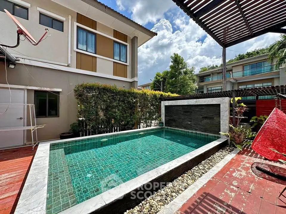 Charming backyard with private pool and modern design in a serene neighborhood.