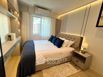 Modern bedroom with stylish decor and natural light