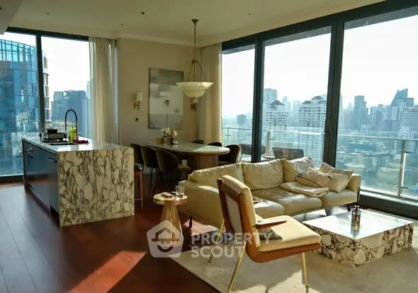 Luxurious open-plan living room with stunning city view and modern furnishings.