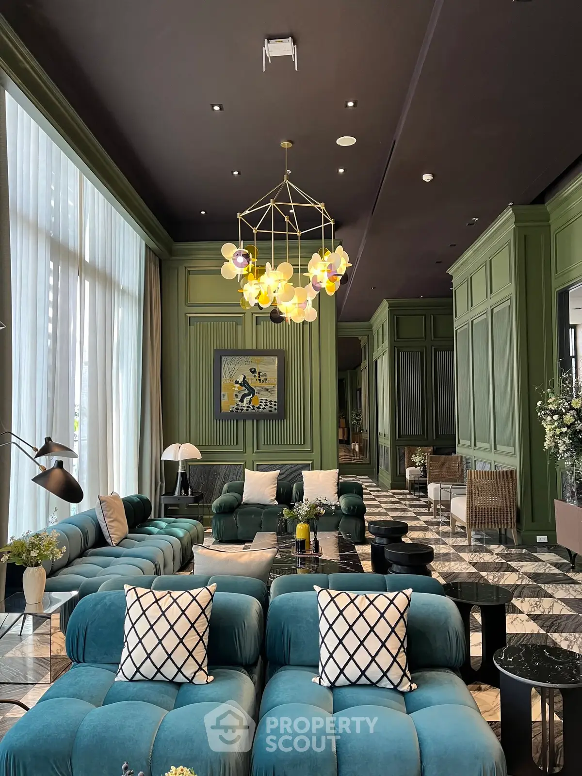Luxurious living room with elegant decor and plush seating in a modern real estate property.