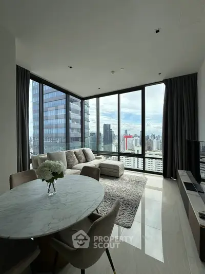 Luxurious modern living room with panoramic city views and elegant decor