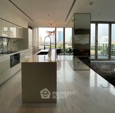 Luxurious modern kitchen with marble island and stunning city view