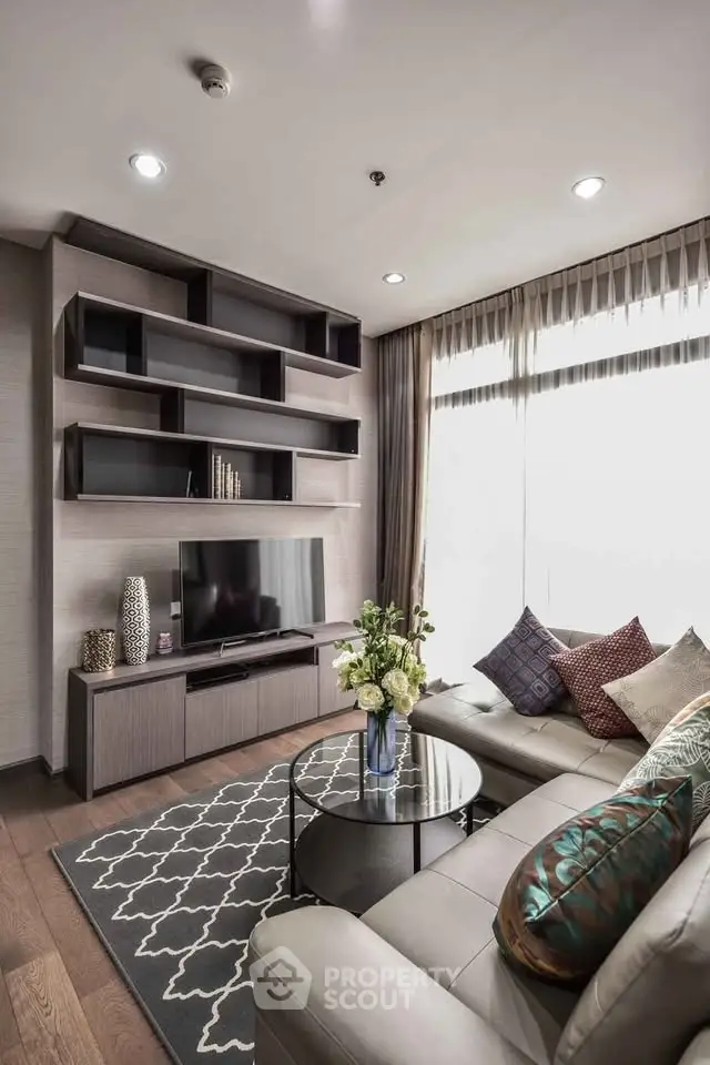 Modern living room with stylish shelving and cozy seating area