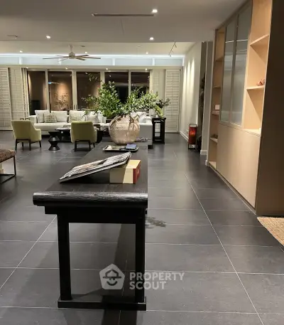 Luxurious modern living room with elegant decor and spacious layout, perfect for relaxation and entertainment.