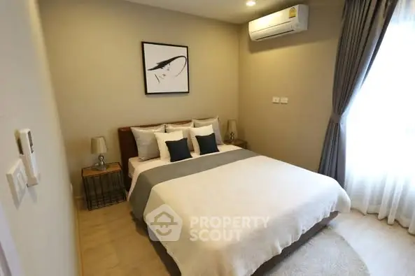 Cozy modern bedroom with stylish decor and natural light