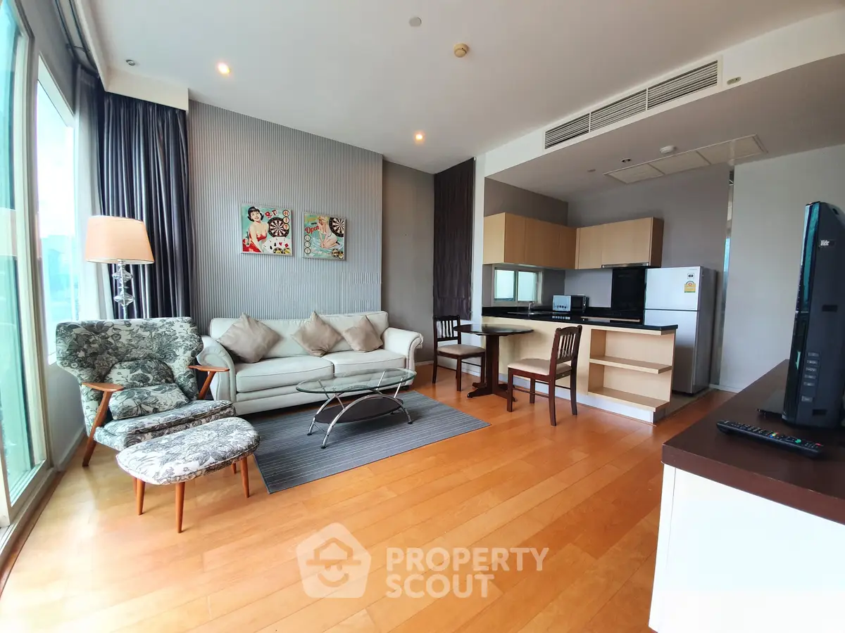 Spacious modern living room with open kitchen and stylish decor