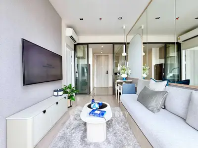 Modern living room with sleek design and stylish decor in a contemporary apartment.
