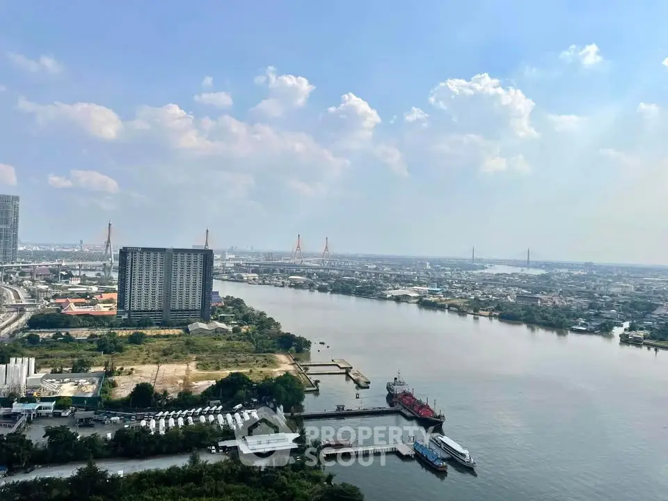 Stunning river view from high-rise building with cityscape and bridges