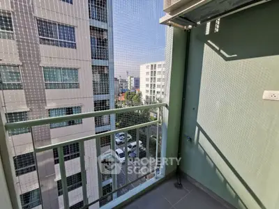 Charming balcony with city view in modern apartment building