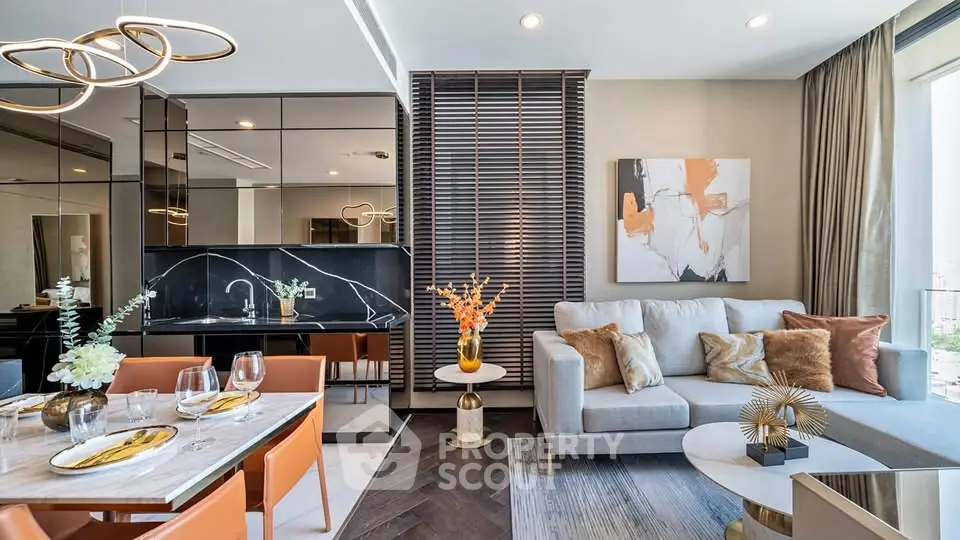 Luxurious modern living room with elegant decor and open kitchen layout.