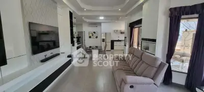 Spacious modern living room with sleek design and open kitchen layout