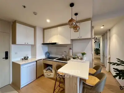 Modern kitchen with open layout and stylish pendant lights