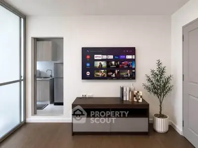 Modern living room with wall-mounted TV and sleek decor