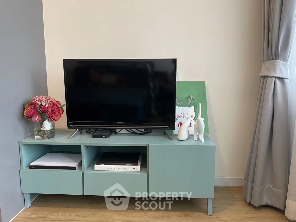 Stylish living room with modern TV stand and decor accents