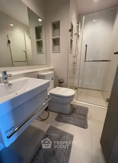 Modern bathroom with sleek shower and stylish fixtures