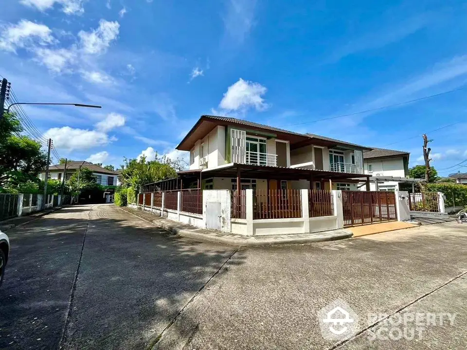 Charming corner unit house with spacious balcony and modern design in a serene neighborhood.