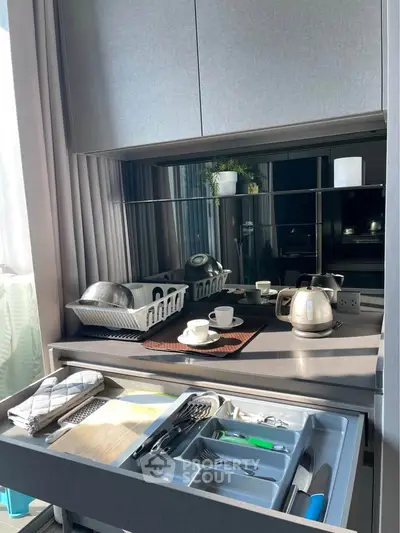 Modern kitchen with sleek cabinetry, integrated appliances, and ample natural light.