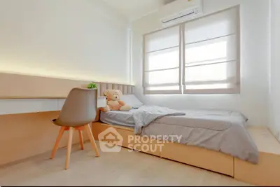 Cozy minimalist bedroom with natural light and modern decor