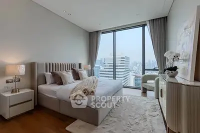 Luxurious bedroom with city view and elegant decor in modern apartment