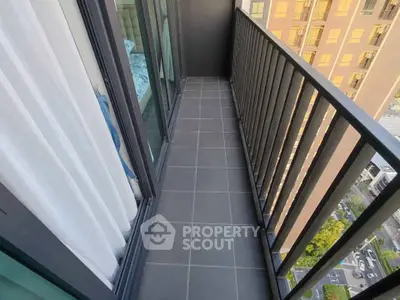 Modern apartment balcony with sleek railing and city view