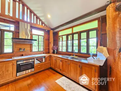 Stunning rustic kitchen with wooden cabinetry and modern appliances