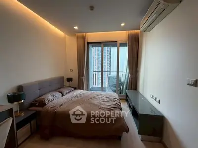 Modern bedroom with balcony view in a high-rise apartment, featuring stylish decor and ample natural light.