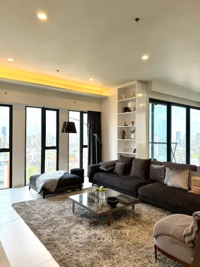 Luxurious living room with panoramic city views and modern decor