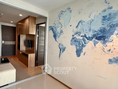 Modern living room with world map wall art and sleek wooden furniture